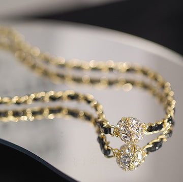 N2629 - Golden Black Droplet Necklace